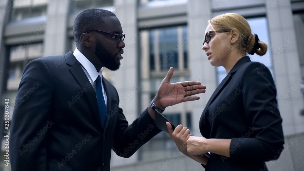 Woman under pressure at work, boss scolds secretary for mistake in annual report Woman under pressure at work, boss scolds secretary for mistake in annual report