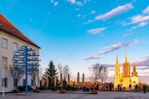 Fototapeta Naklejka Na Ścianę i Meble -  View of Zagreb cathedral and of St. Mary church from upper town at sunset, Croatia