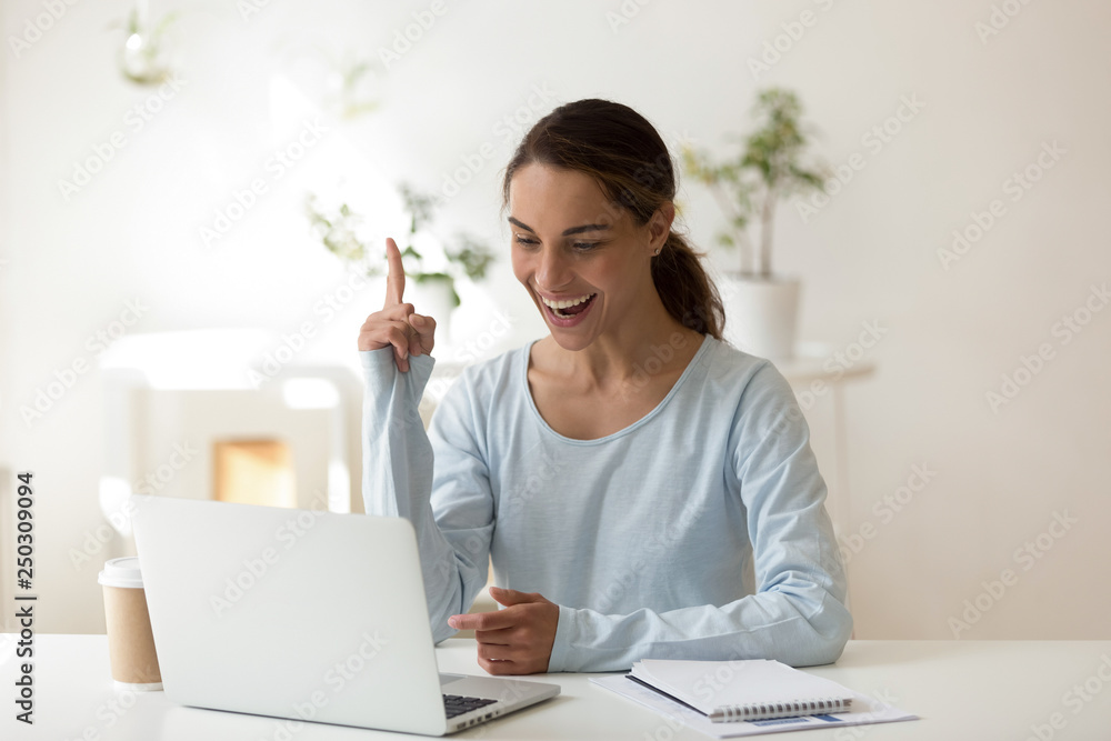 Woman working on computer feels contented knows how solve problem Woman working on computer feels contented knows how solve problem