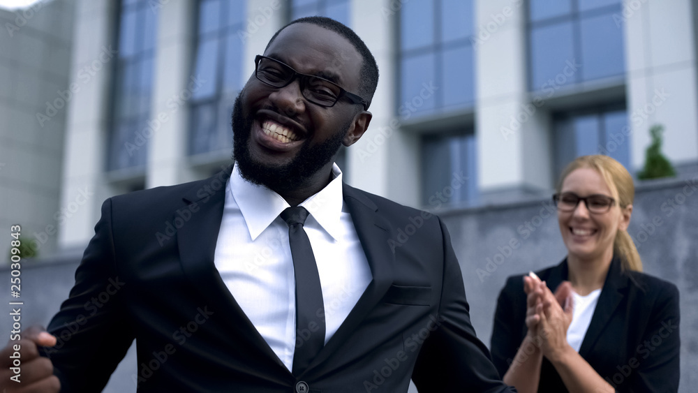 Funny businessman happy to get promotion, celebrating success, team support Funny businessman happy to get promotion, celebrating success, team support