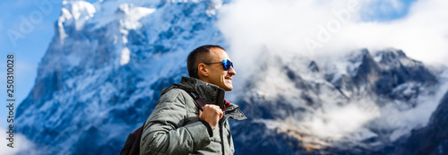 Man in outerwear on a snow-covered mountain