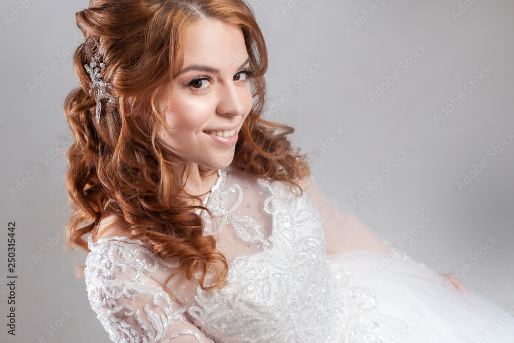 Portrait of a charming red-haired bride, Studio, close-up. Wedding hairstyle and makeup. Portrait of a charming red-haired bride, Studio, close-up. Wedding hairstyle and makeup.