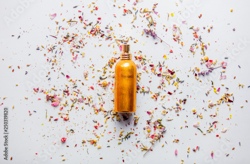 bottle of perfume lavender petals