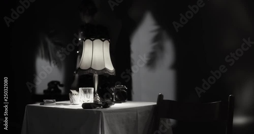 Beautiful woman answering a phone call in her hotel room