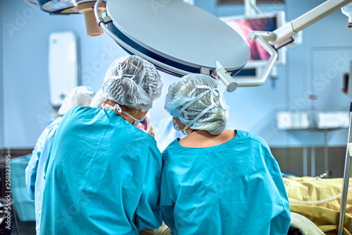 Surgeons team working in the hospital, operating room