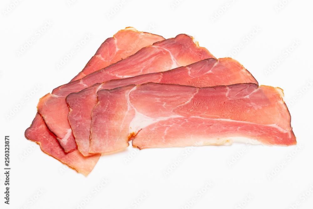 Hamon sliced on white background. Spanisch traditional meat. Hamon sliced on white background. Spanisch traditional meat.