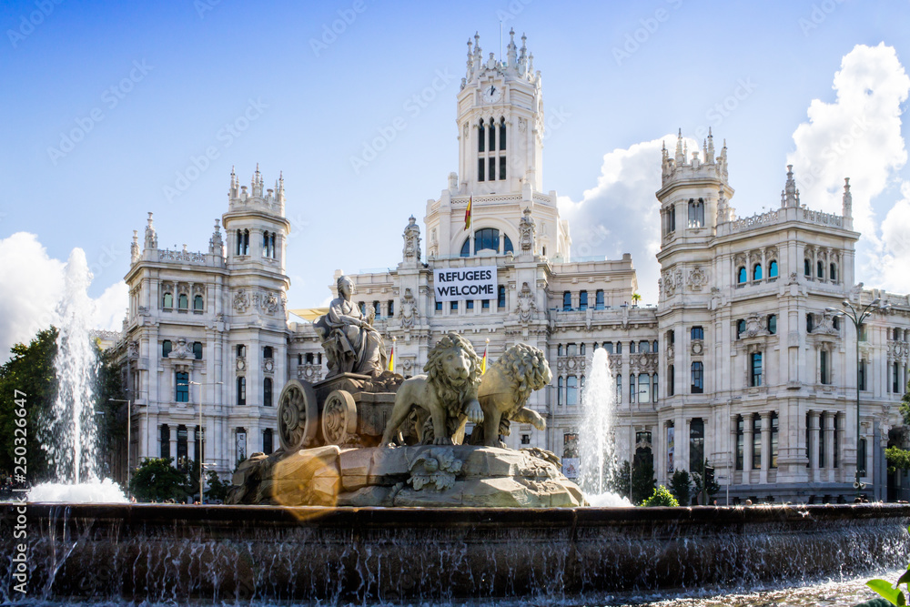 Cybele Fountain and City Council of Madrid welcoming refugees