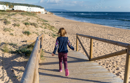  Young girl on the beach,  Los Caños de Meca, Andalucía, Spain © pikselstock
