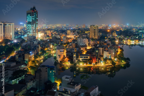 Hanoi Vietnam aerial cityscape view at night. City urban skyline of old town district