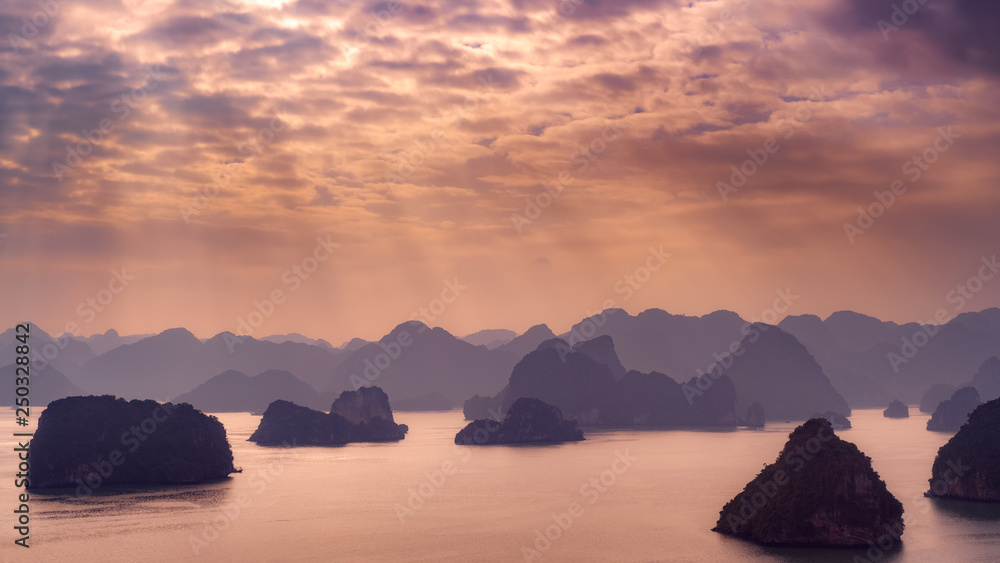 Ha Long Bay Vietnam. Aerial panoramic view. Famous travel nature destination. Green mountains in the water. Islands landscape at Halong