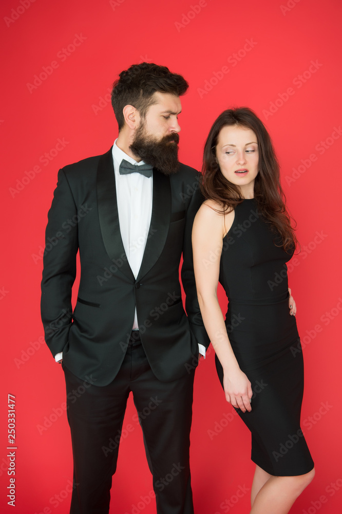 Man bearded wear tuxedo girl elegant dress. Visiting event or ceremony. Couple classy clothes. Elite event. Main rules picking clothes. Corporate party. All black dress code. Official event concept