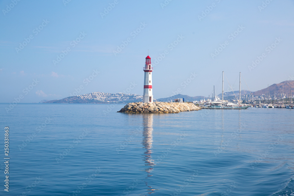Boat trip to Bodrum, Turkey. Beautiful view to Mediterranean sea and lighthouse. View from boat. 