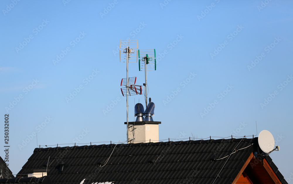 Antennas on the roof of a private home Antennas on the roof of a private home