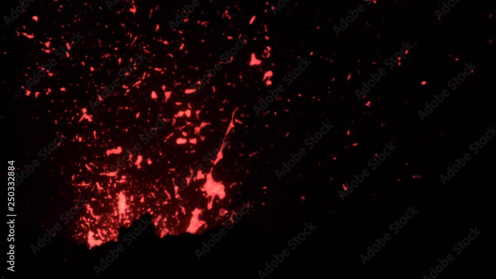 SLOW MOTION, CLOSE UP: Old active volcanic mountain in Sicily violently erupting at night. Breathtaking view of bright red pieces of lava flying out of the depths of Mount Yasur. Powerful nature SLOW MOTION, CLOSE UP: Old active volcanic mountain in Sicily violently erupting at night. Breathtaking view of bright red pieces of lava flying out of the depths of Mount Yasur. Powerful nature