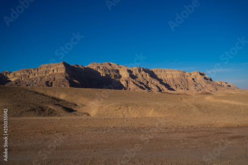 Solitary desert rocks under the blue sky in Timna park near Eilat Israel