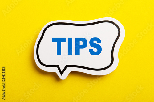 Canvastavla Tips Speech Bubble Isolated On Yellow Background