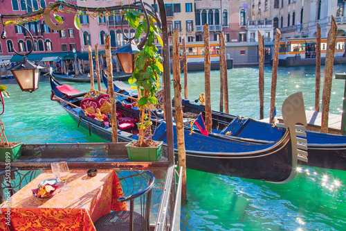 Luxury Gondola waiting for tourists near Rialto Bridge in Venice