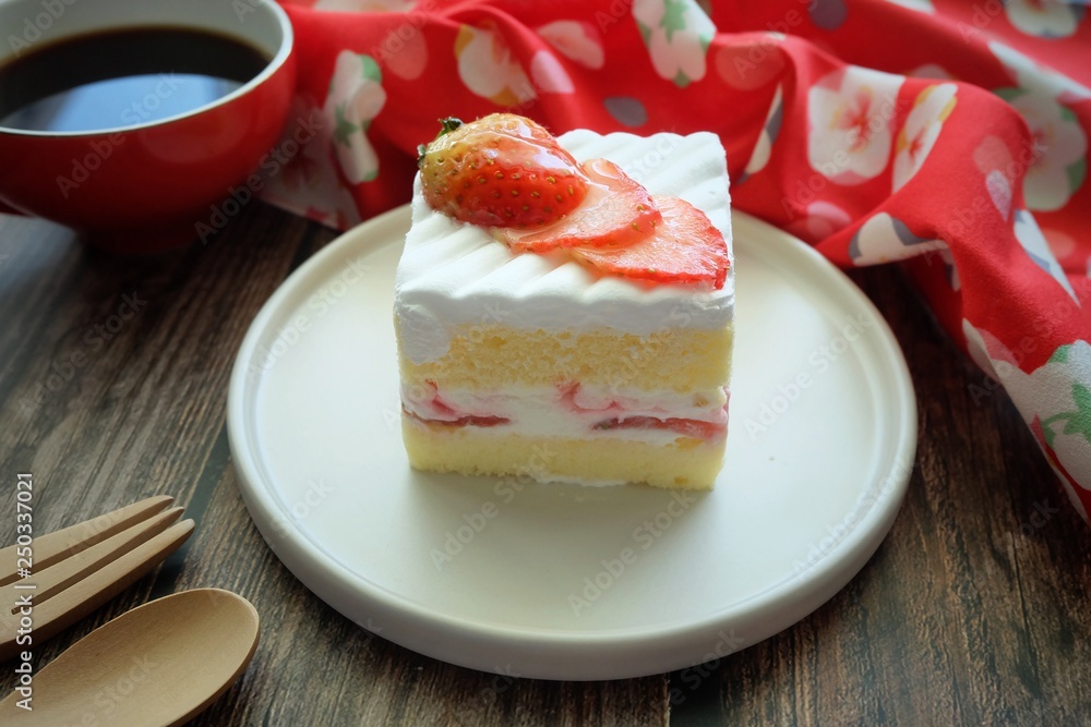 Close up of Strawberry shortcake on white plate Close up of Strawberry shortcake on white plate