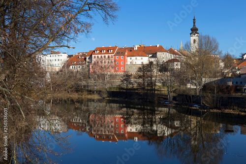 Sunny winter royal medieval Town Pisek with the Castle above the river Otava, Czech Republic 