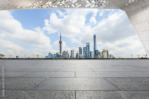 Empty square floor and lujiazui financial district cityscape in Shanghai