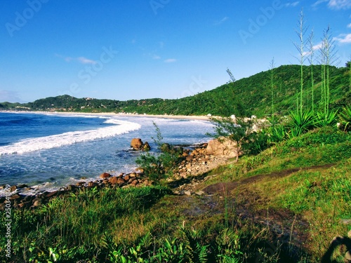 Beach, hills, trails, rocks and pools of natural water.