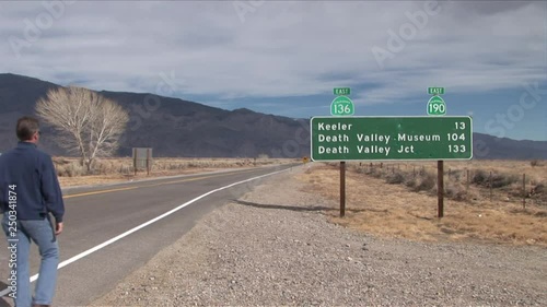 A man walking along Death Valley in California United States