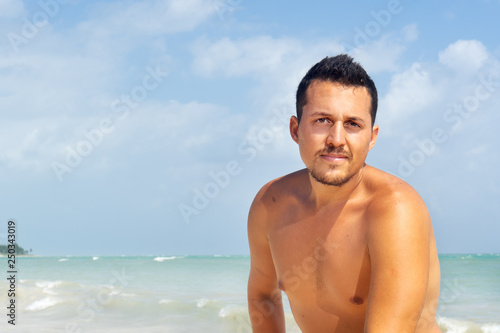 Young man portrait at the  beach