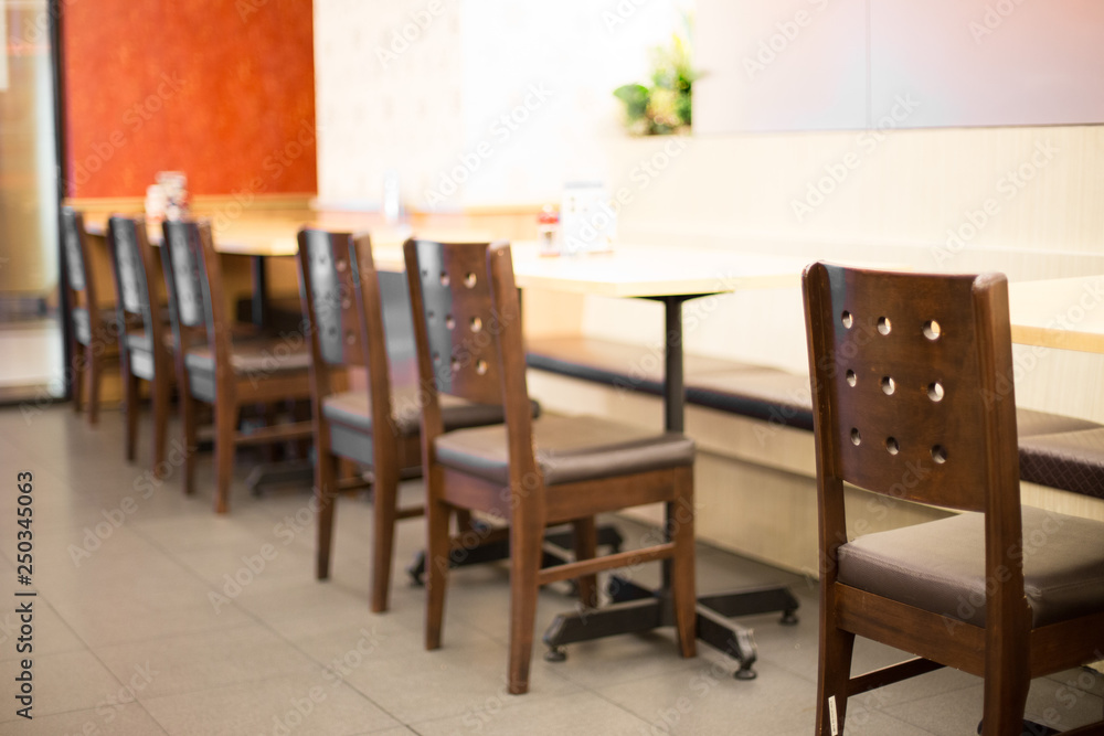 Blurred of Table and chairs in the restaurant Blurred of Table and chairs in the restaurant