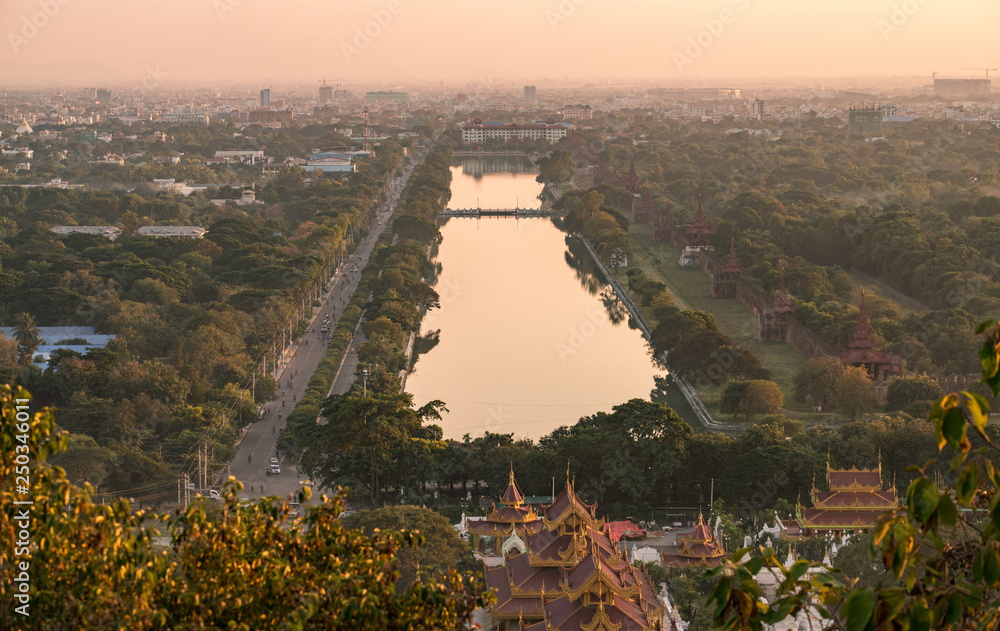 Aerial view of Mandalay palace moat and wall at sunset, view from Mandalay hills.