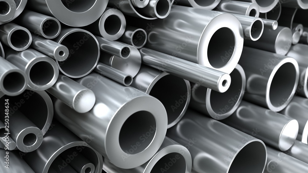 Close-up different new metallic round pipes on factory warehouse. Close-up different new metallic round pipes on factory warehouse.