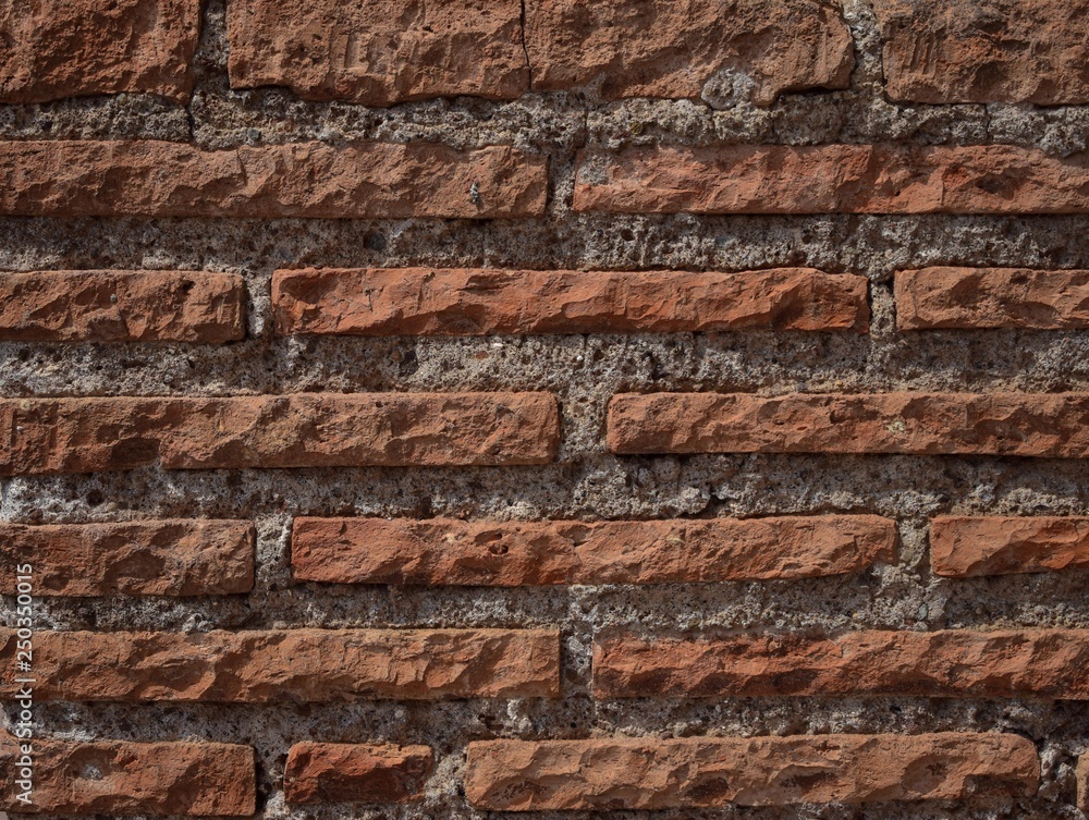 parte de un muro cosntruido con viejos ladrillo romanos parte de un muro cosntruido con viejos ladrillo romanos