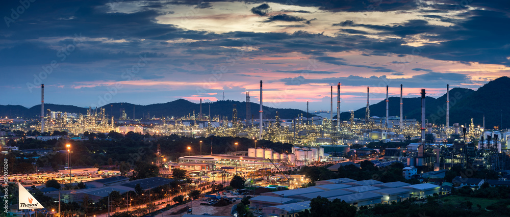 Beautiful sunset  petrochemical oil refinery factory plant cityscape of Chonburi province at night on 2018 , landscape Thailand
