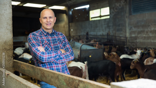 Tableau sur toile Confident man owner of dairy farm