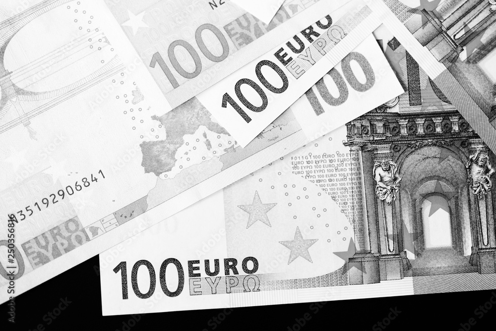 One Hundred euro banknotes as a background close up. Black and white
