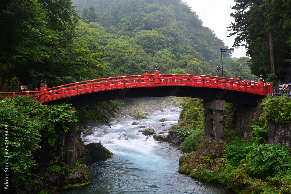 Shinkyo bridge (red wood bridge) famous travel destination of Nikko, Japan. Shinkyo bridge (red wood bridge) famous travel destination of Nikko, Japan.