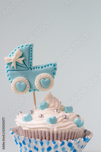 Baby shower cupcake for a boy. Newborn announcement concept. Text space