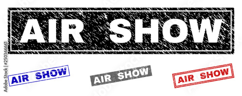 Grunge AIR SHOW rectangle stamp seals isolated on a white background. Rectangular seals with grunge texture in red, blue, black and grey colors.