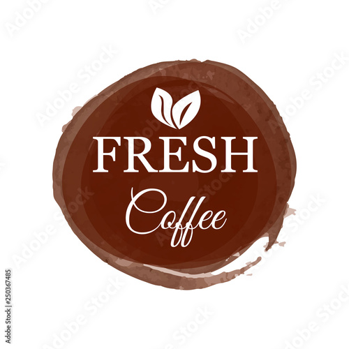 Creative logo in form of big brown stain with fresh coffee decorated coca tree leaves