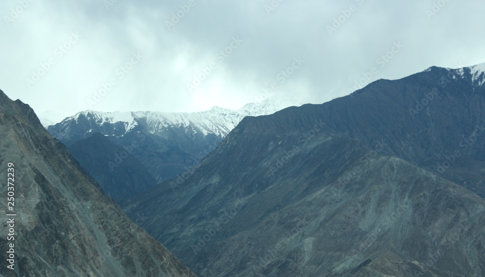 Spectacular mountain scenery. Snow Mountain with Blue Sky,