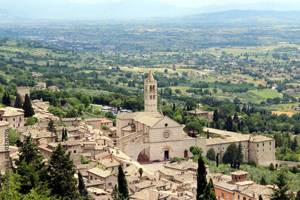 Assisi, Umbria, Italy. Panoramic view of the ancient town and the Basilica of Santa Chiara.