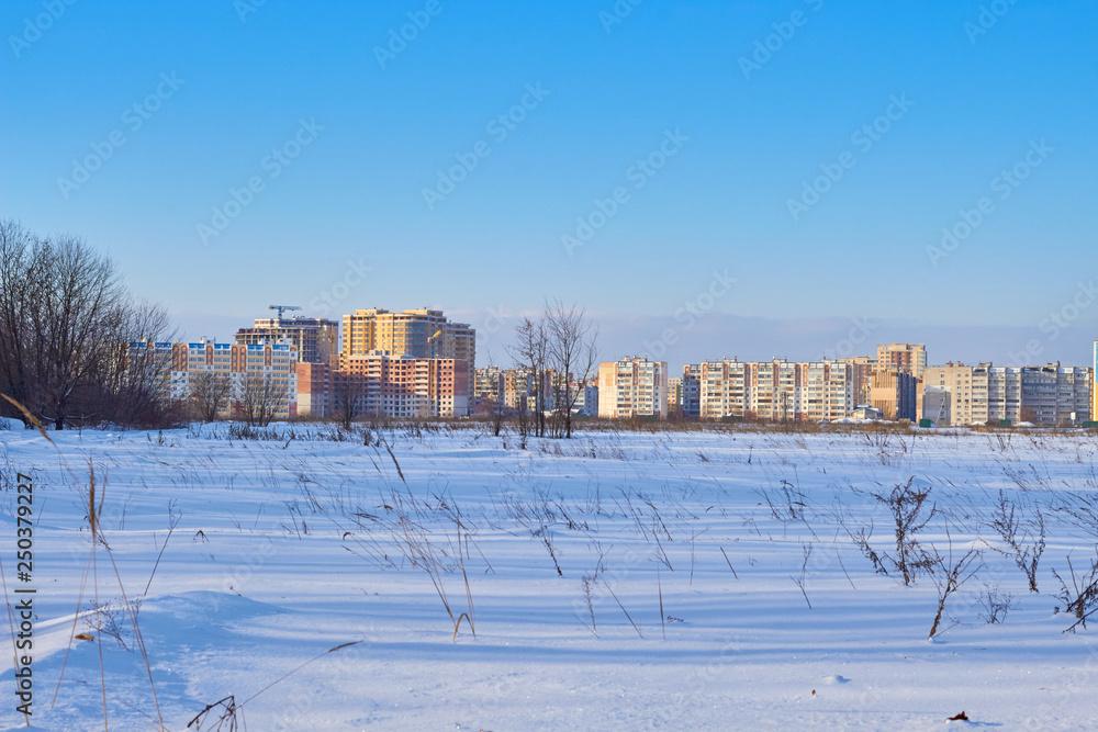 Fototapeta premium winter city in the morning sunrise