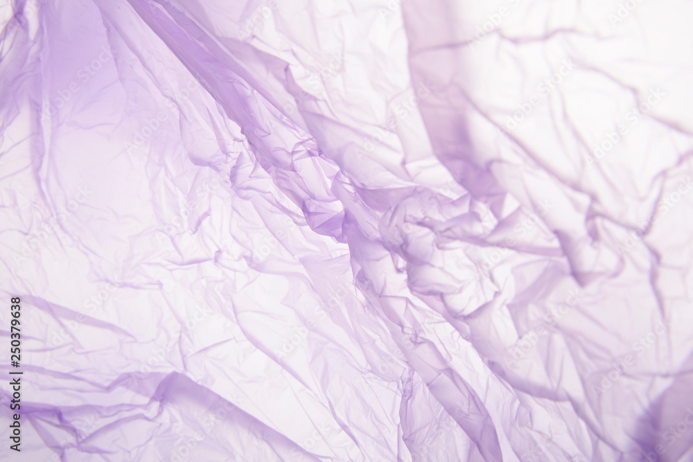 Light purple plastic garbage bag material as a background