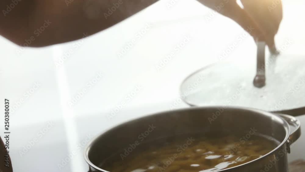 Chef adds salt to the dish, cooking in slow motion Chef adds salt to the dish, cooking in slow motion