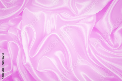 Smooth elegant pink silk or satin texture can use as abstract background, beautiful fabric