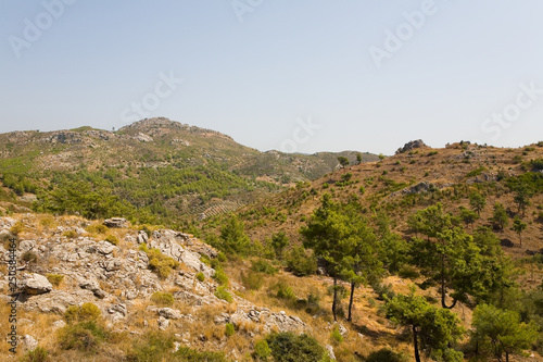 Mountain landscape of Turkey with agricultural landings.