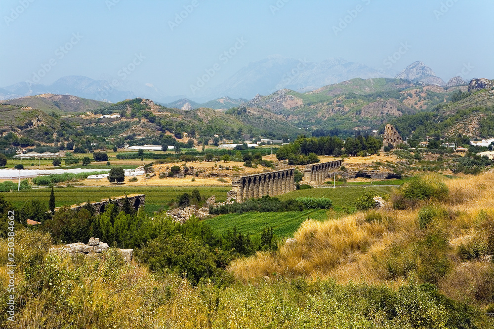 The ruins of an ancient aqueduct near the town of Aspendos.