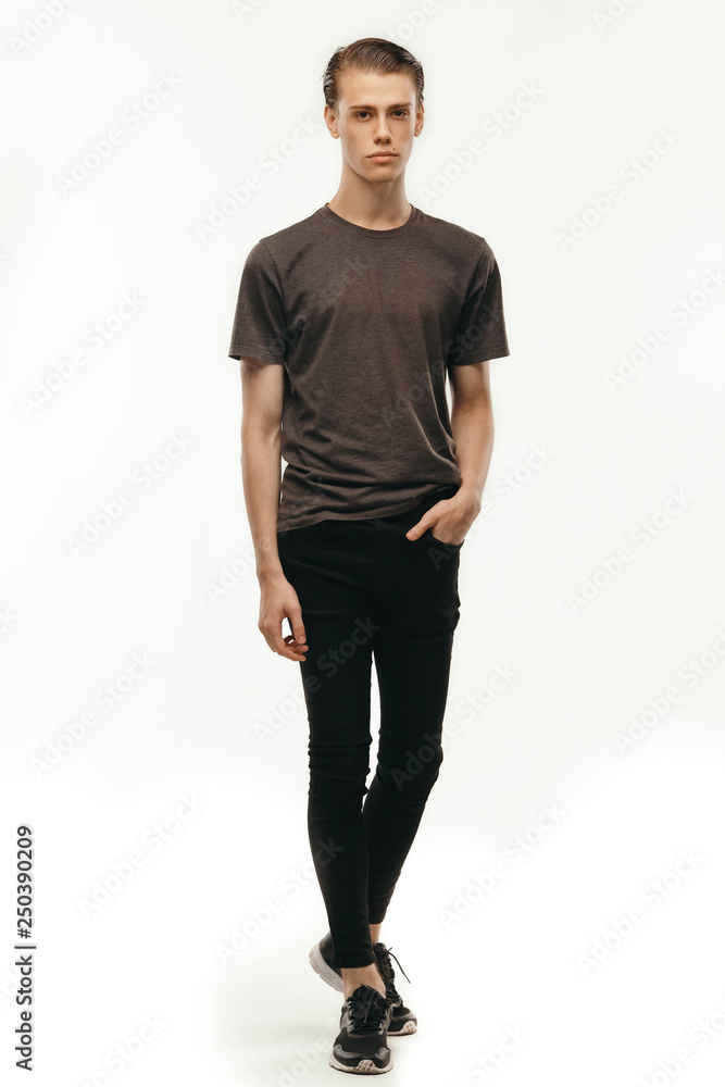 Confident and cheerful isolated full lenght portrait handsome Caucasian male. Full body shot looking at camera standing against white background. People, commercials and advertisement concept Confident and cheerful isolated full lenght portrait handsome Caucasian male. Full body shot looking at camera standing against white background. People, commercials and advertisement concept