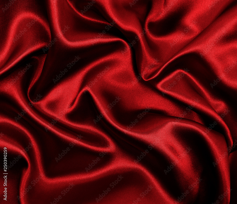 Smooth elegant red silk or satin luxury cloth texture as abstract  background. Luxurious valentines day background design Stock Photo