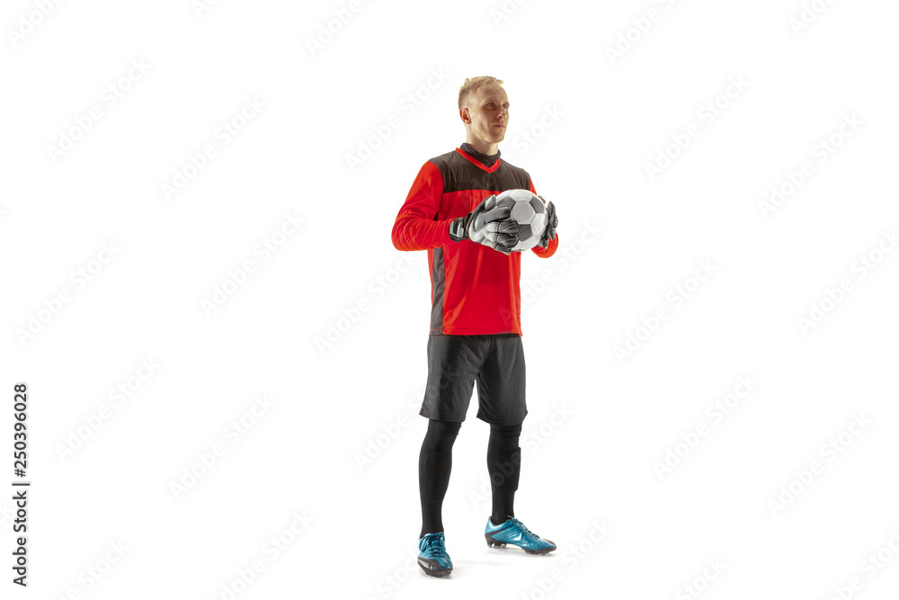 One male soccer player goalkeeper standing and holding ball. Silhouette isolated on white studio background One male soccer player goalkeeper standing and holding ball. Silhouette isolated on white studio background