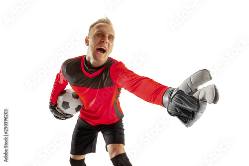 One male soccer player goalkeeper pointing away and screaming isolated on white background. Appeal to the referee, order to defenders and human emotions concept © master1305